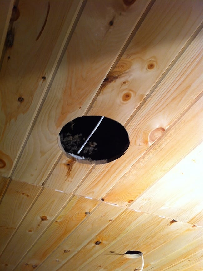 installing speakers on a wood plank ceiling