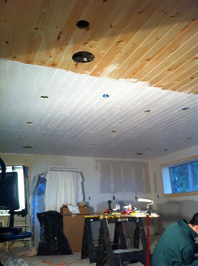 priming a wood plank ceiling