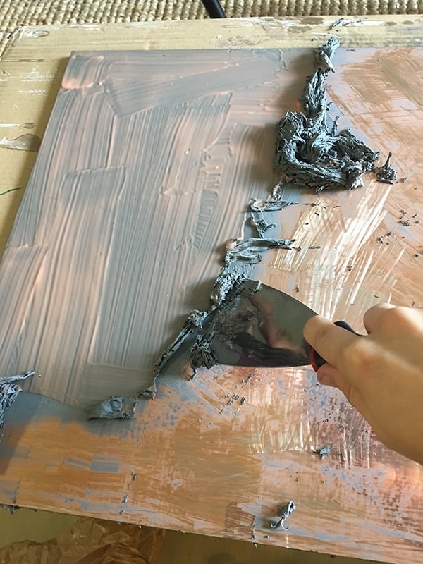 scraping off the back of a mirror