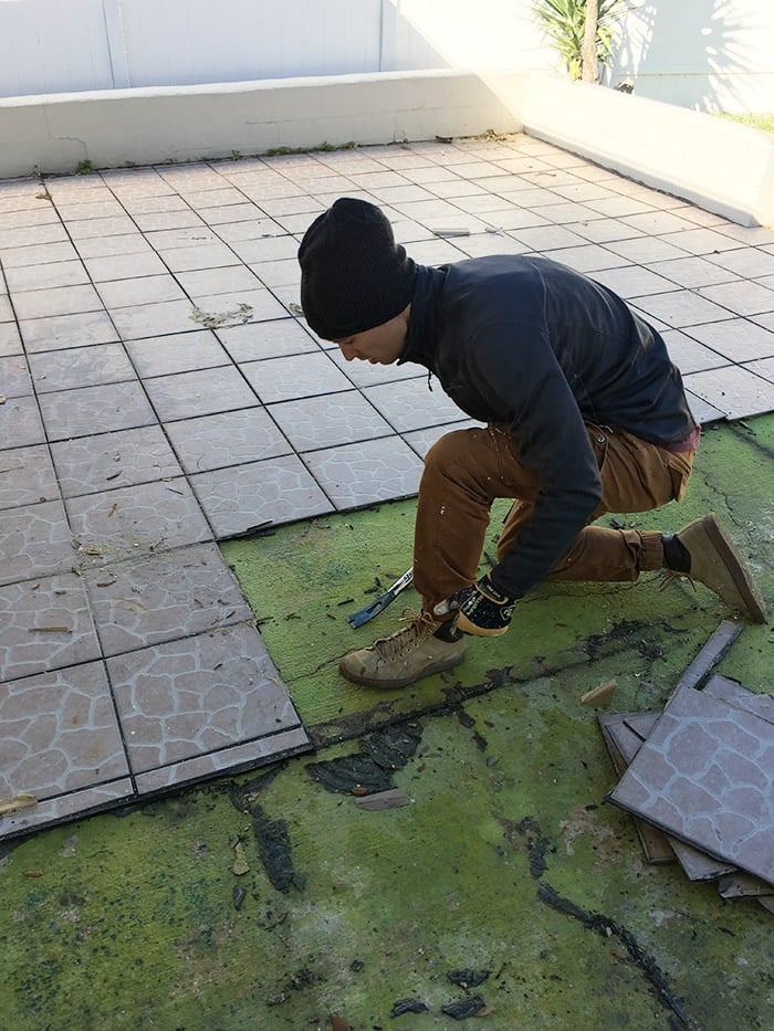 removing tile in the backyard