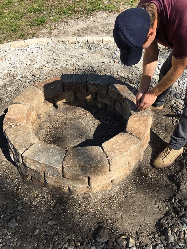 assembling a backyard fire pit kit