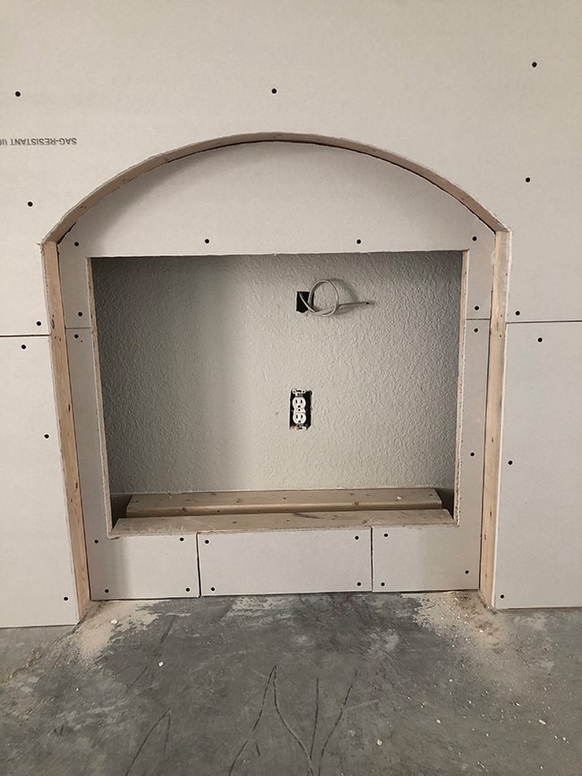 adding drywall to a diy electric fireplace framing