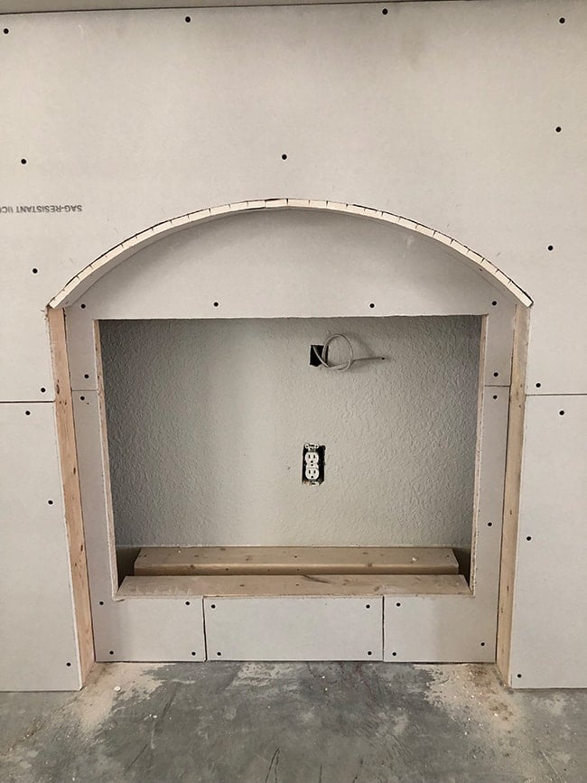 adding drywall to a diy electric fireplace framing