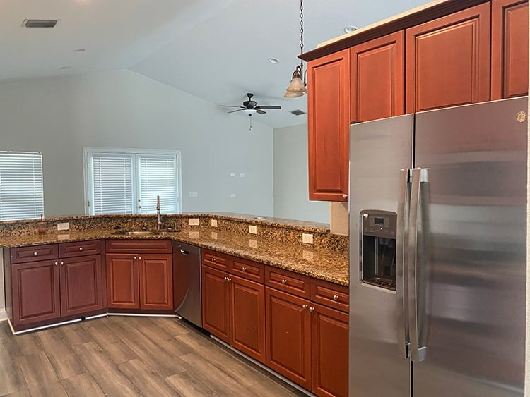 Cabinets With Mini Fridge & Microwave Flanked By Taupe Built In Bink Beds  Design Ideas