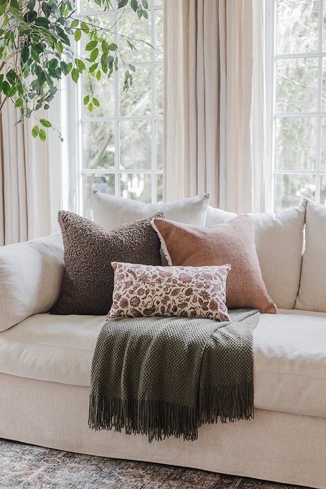 These Throw Pillows Will Take Your Sofa From Fall To Winter