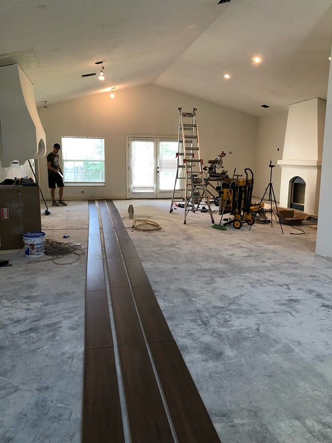 dark laminate wood planks in a vaulted living room