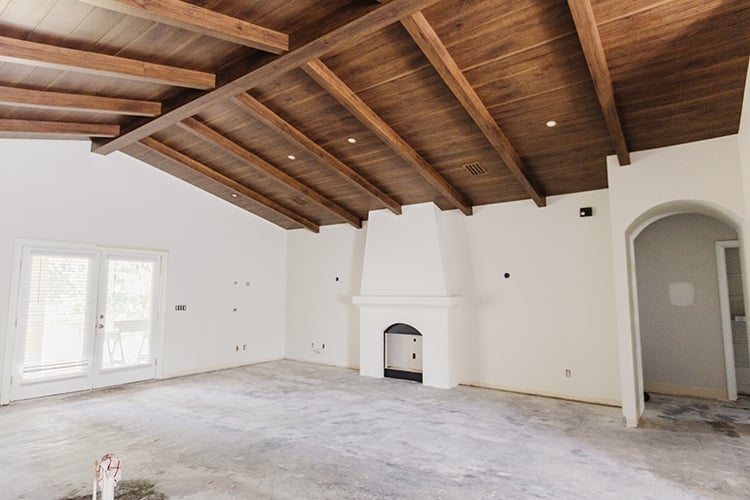 diy custom wood beam ceiling in a spanish style home