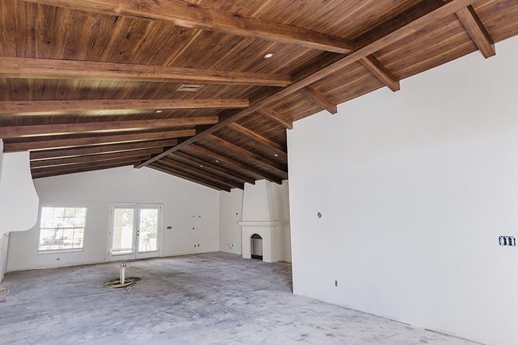 dark wood beam ceiling in a spanish style home