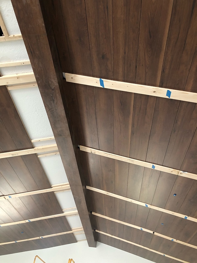 wood beam and plank vaulted ceiling installation