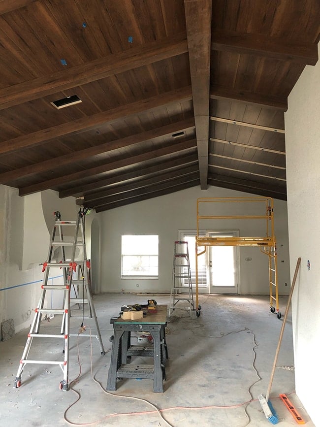 diy wood beam and plank vaulted ceiling using laminate floors