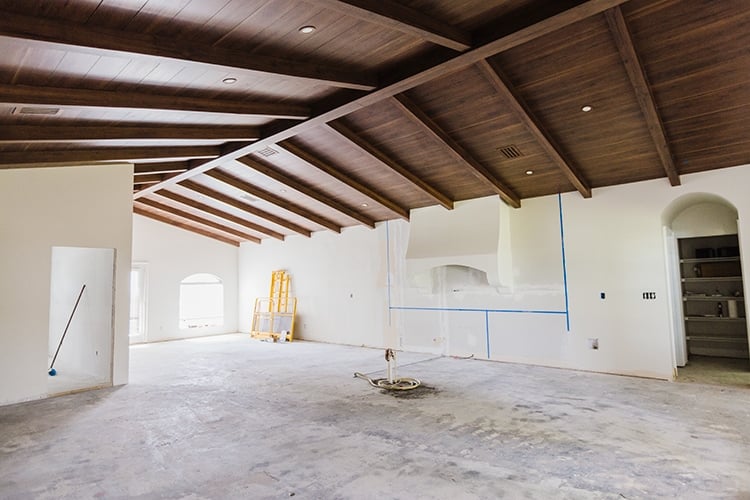 diy custom wood beam ceiling in a spanish style home