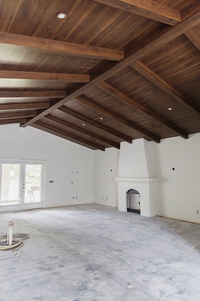 diy custom wood beam ceiling in a spanish style home