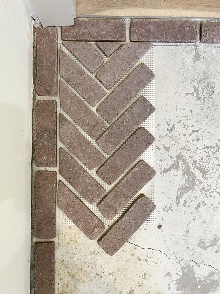how to install herringbone brick floors