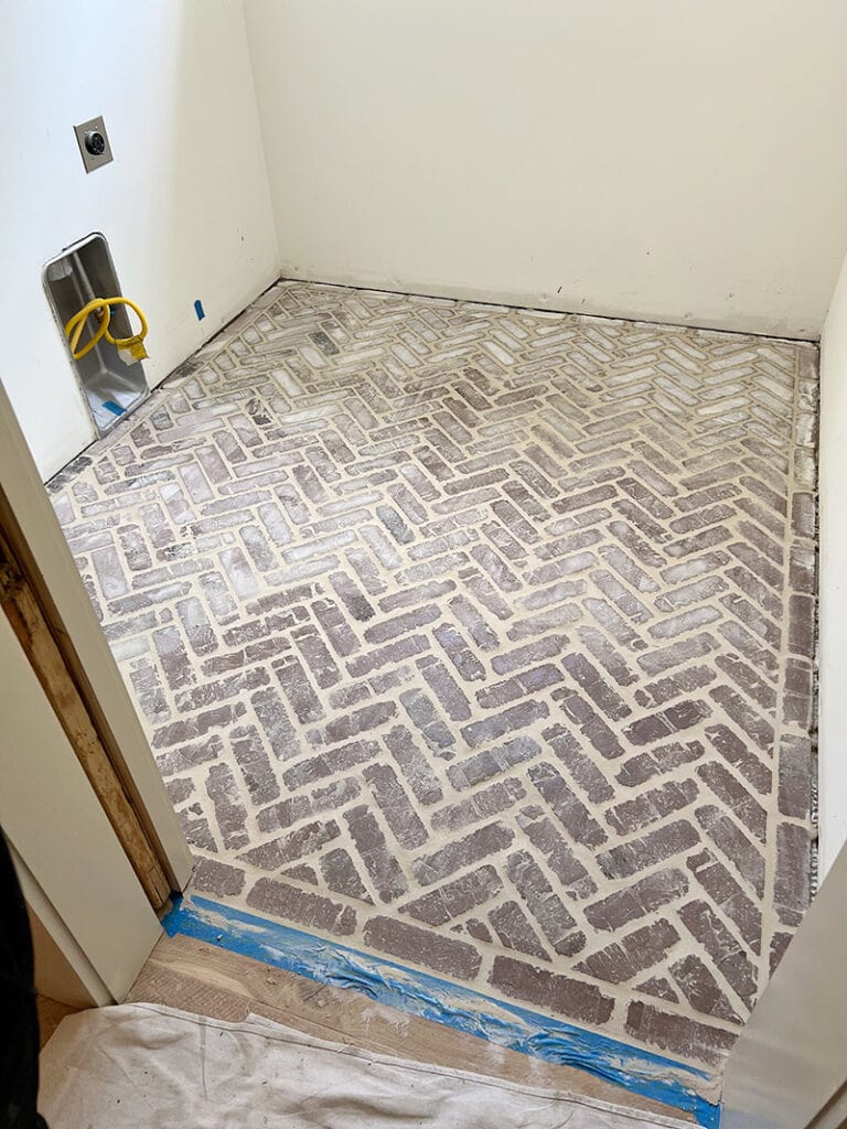 grouted herringbone brick floors