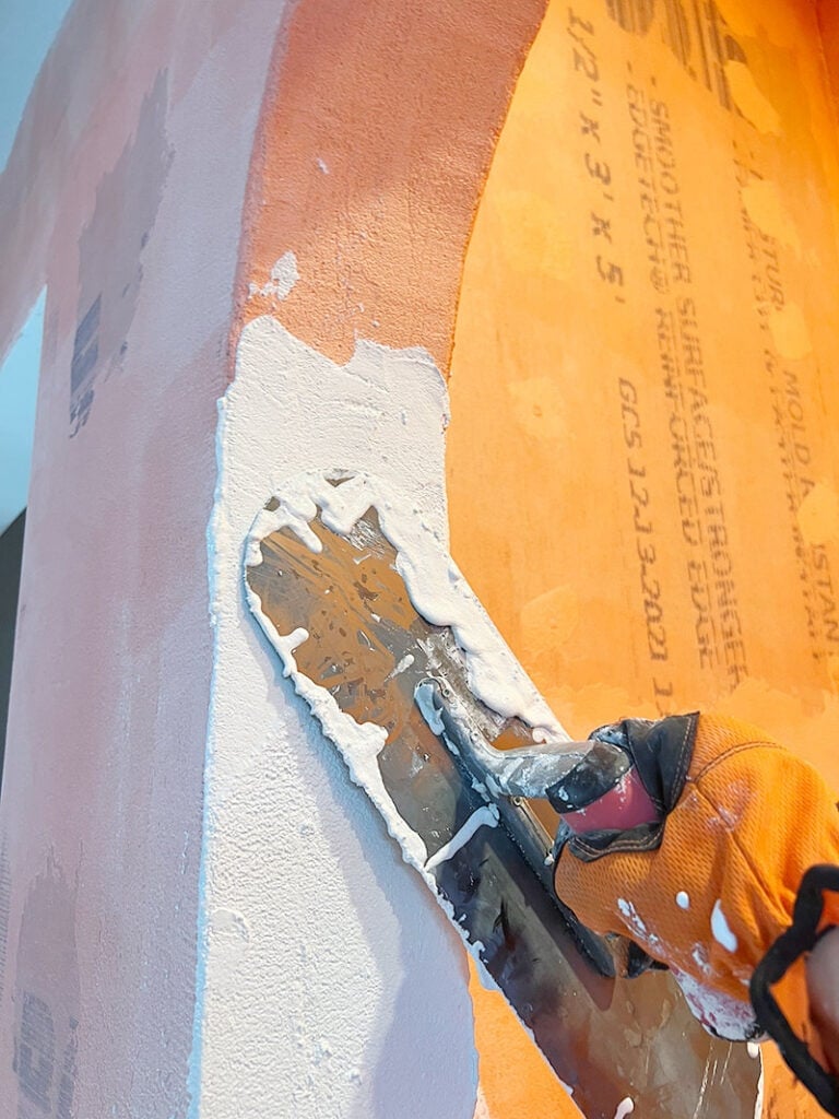 applying microcement in the shower