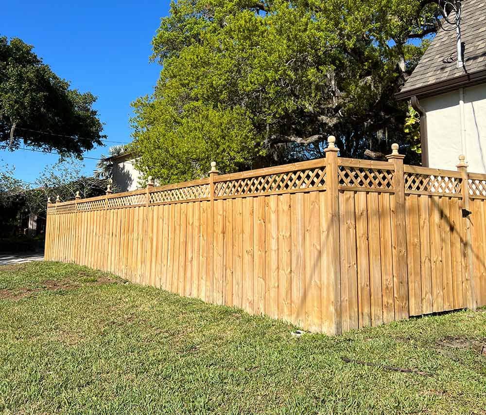 board on board fence with ball finials