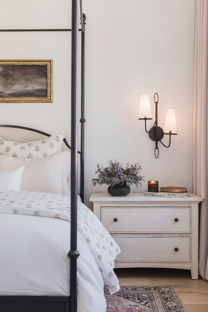 light neutral bedroom with night stand