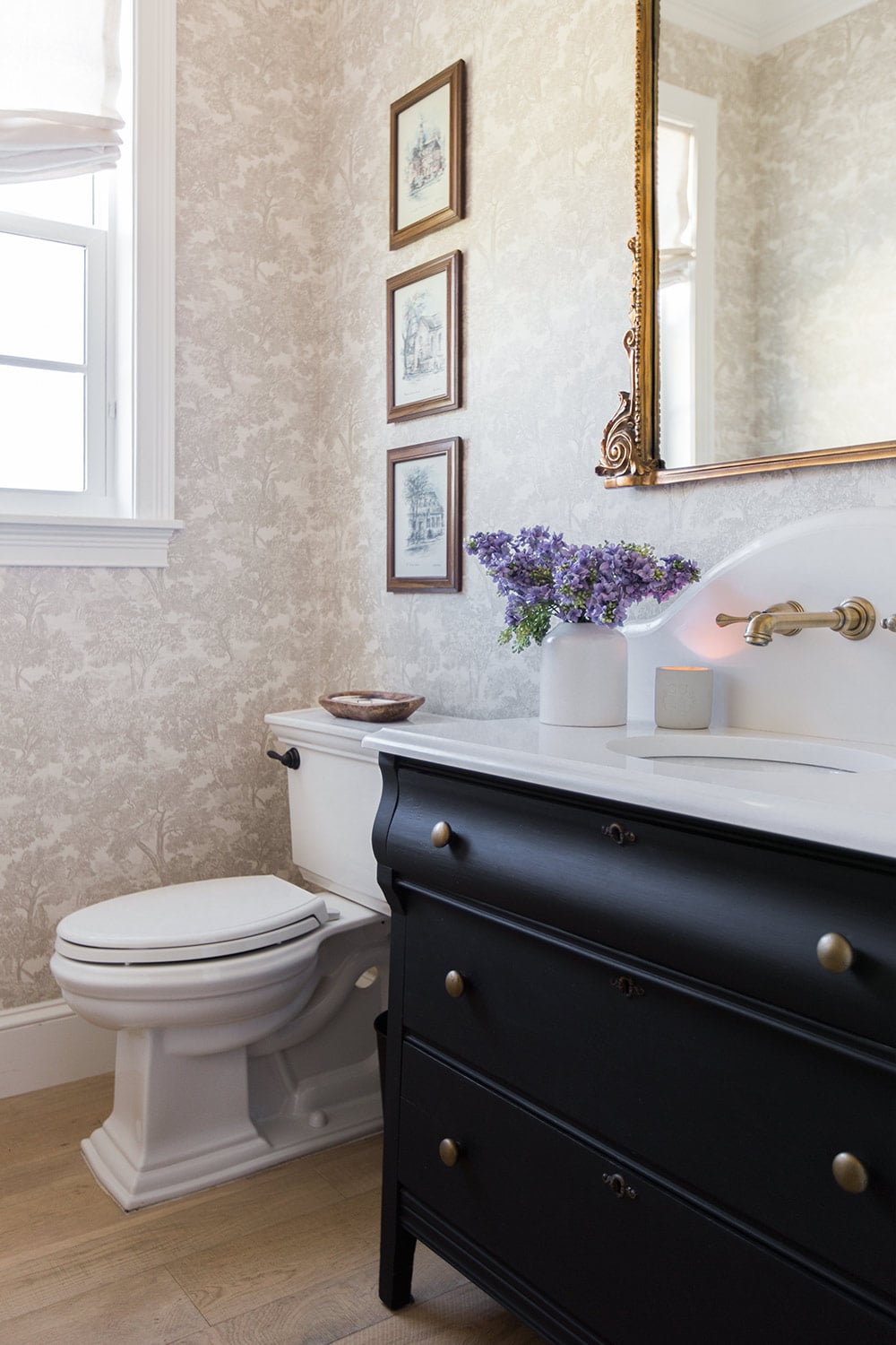 powder bath with purple lilac stems
