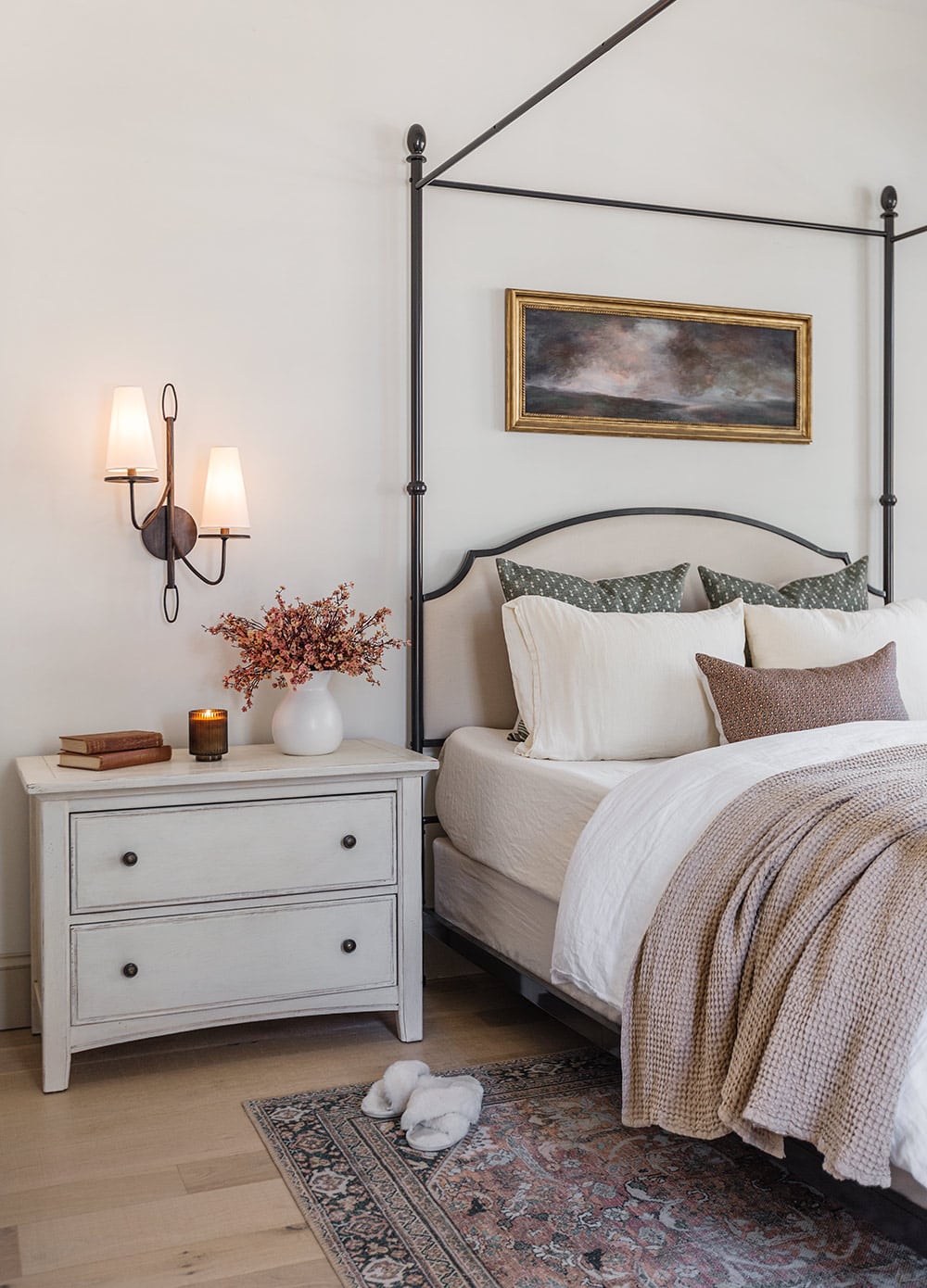 neutral spring bedroom with pink babys breath flowers