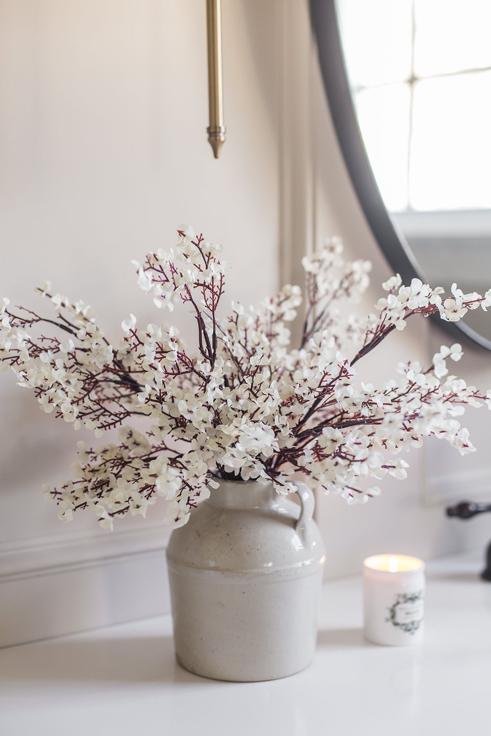 white artificial baby's breath flowers in vase