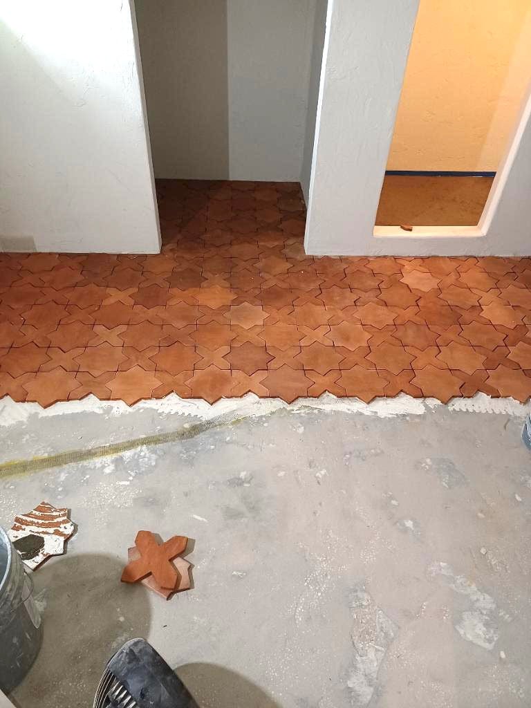 star and cross cotto tile installation