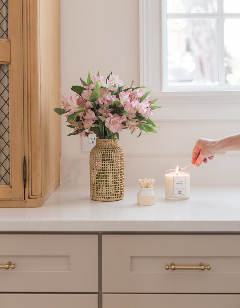 lighting henro candle on kitchen counter