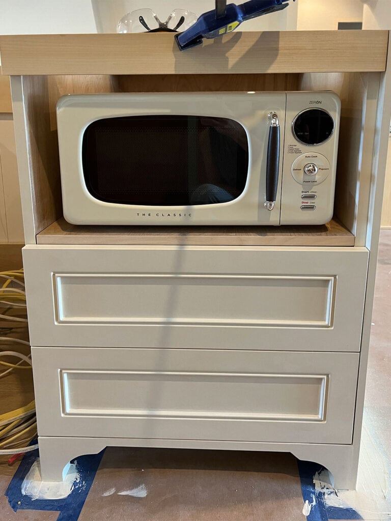 https://www.jennasuedesign.com/wp-content/uploads/2022/05/custom-microwave-cabinet-768x1024.jpg