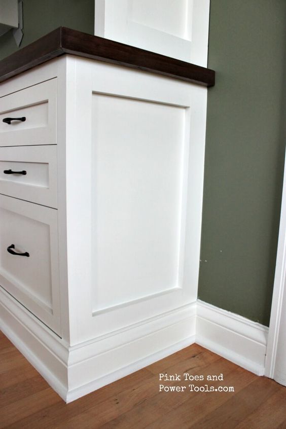 end of cabinet with custom white shaker trim detail