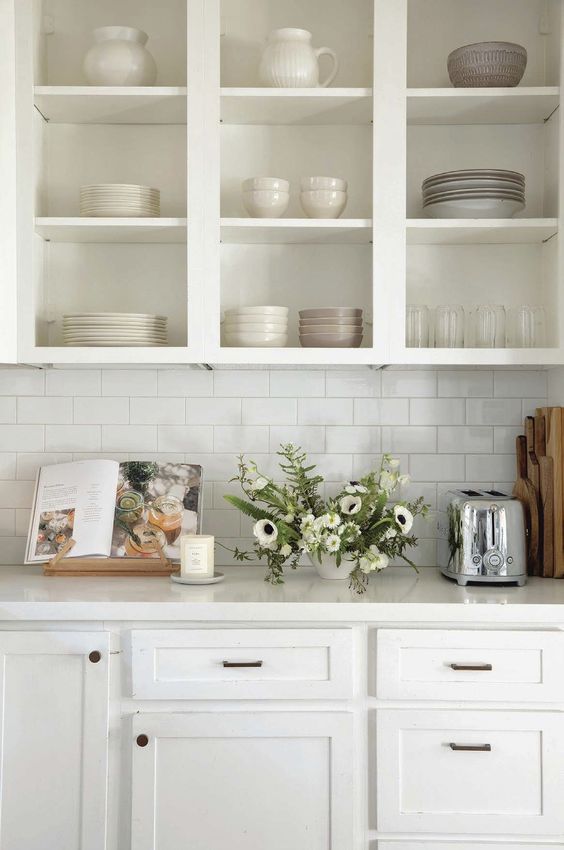 white kitchen with doors removed from upper cabinets