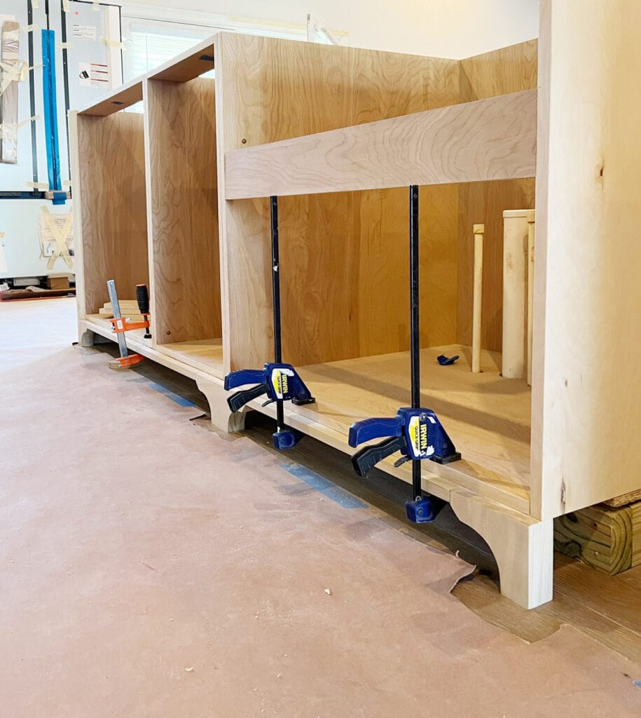 furniture feet toe kick valance clamped to a cabinet box