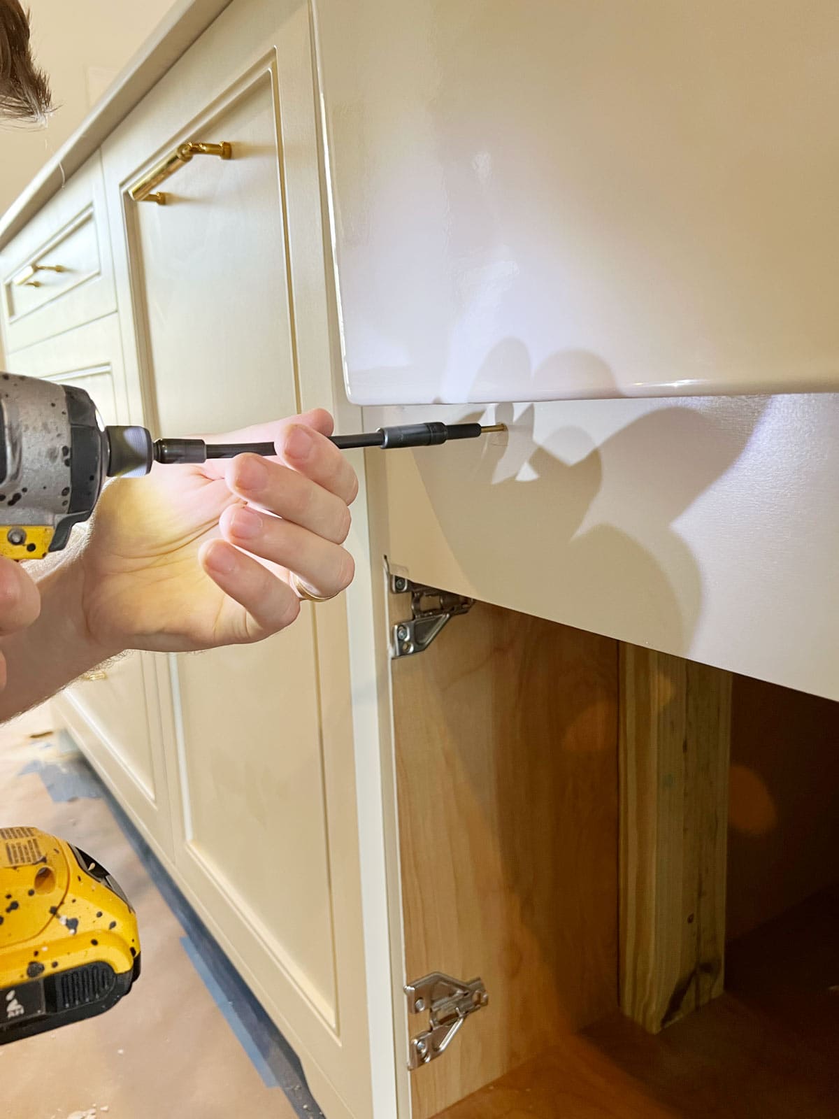 installing a sink drip ledge