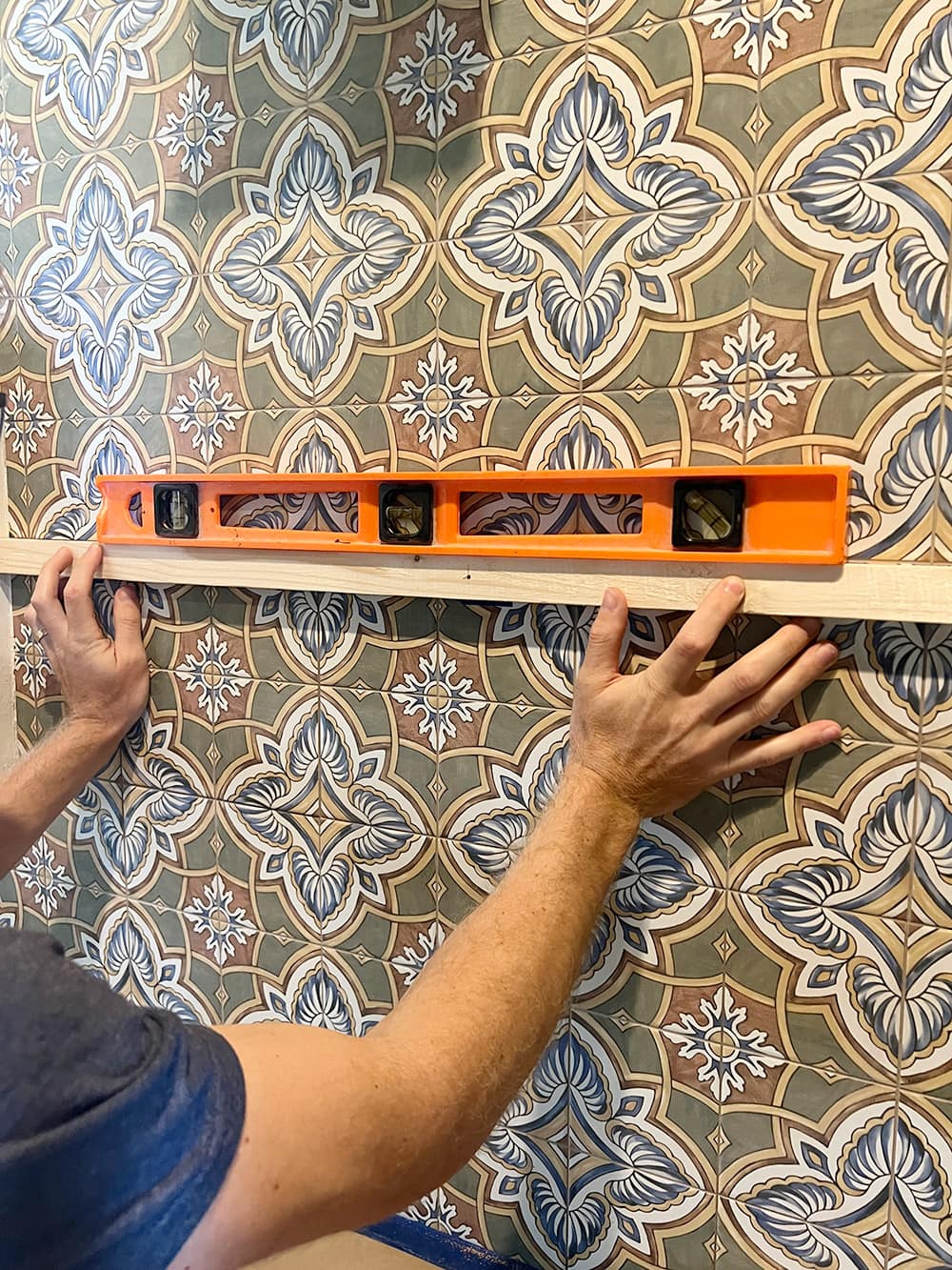 hanging floating shelves on a tiled wall