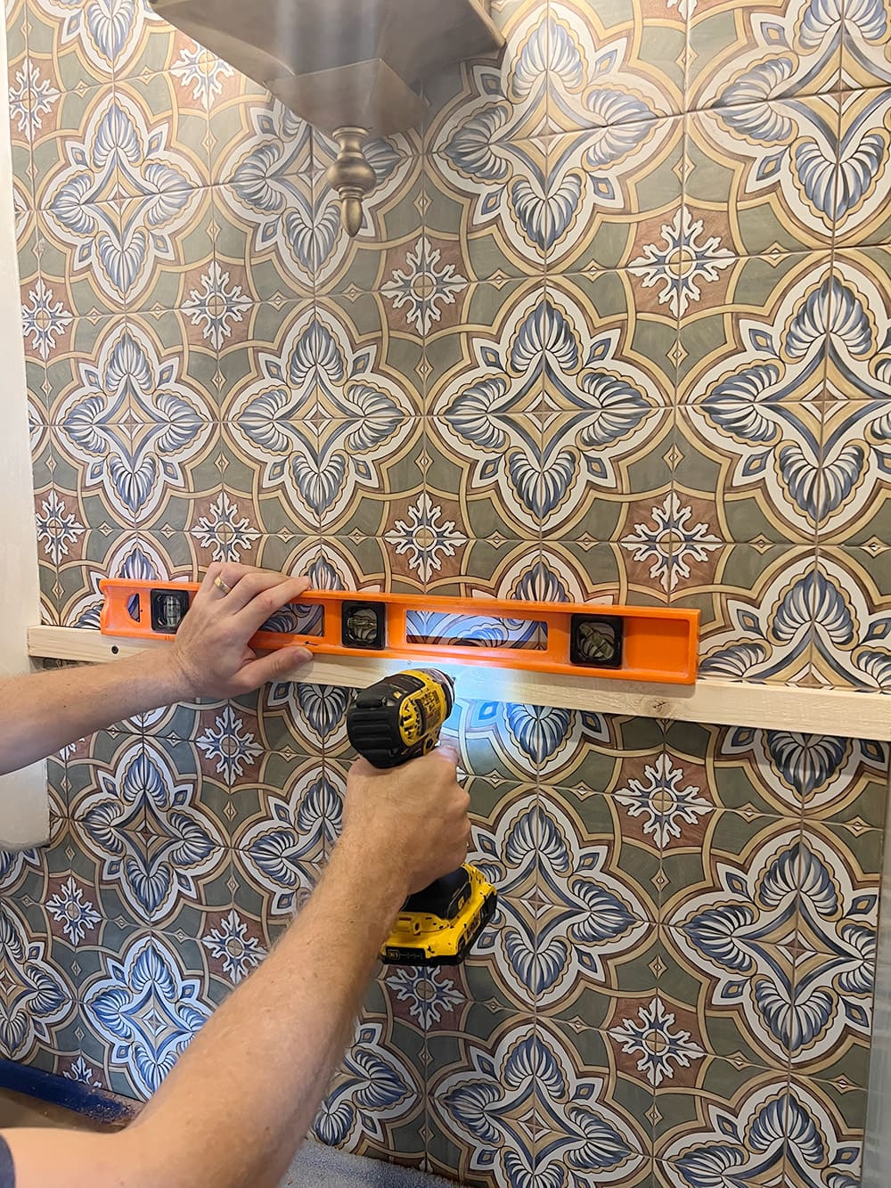 drilling shelf support into tile wall