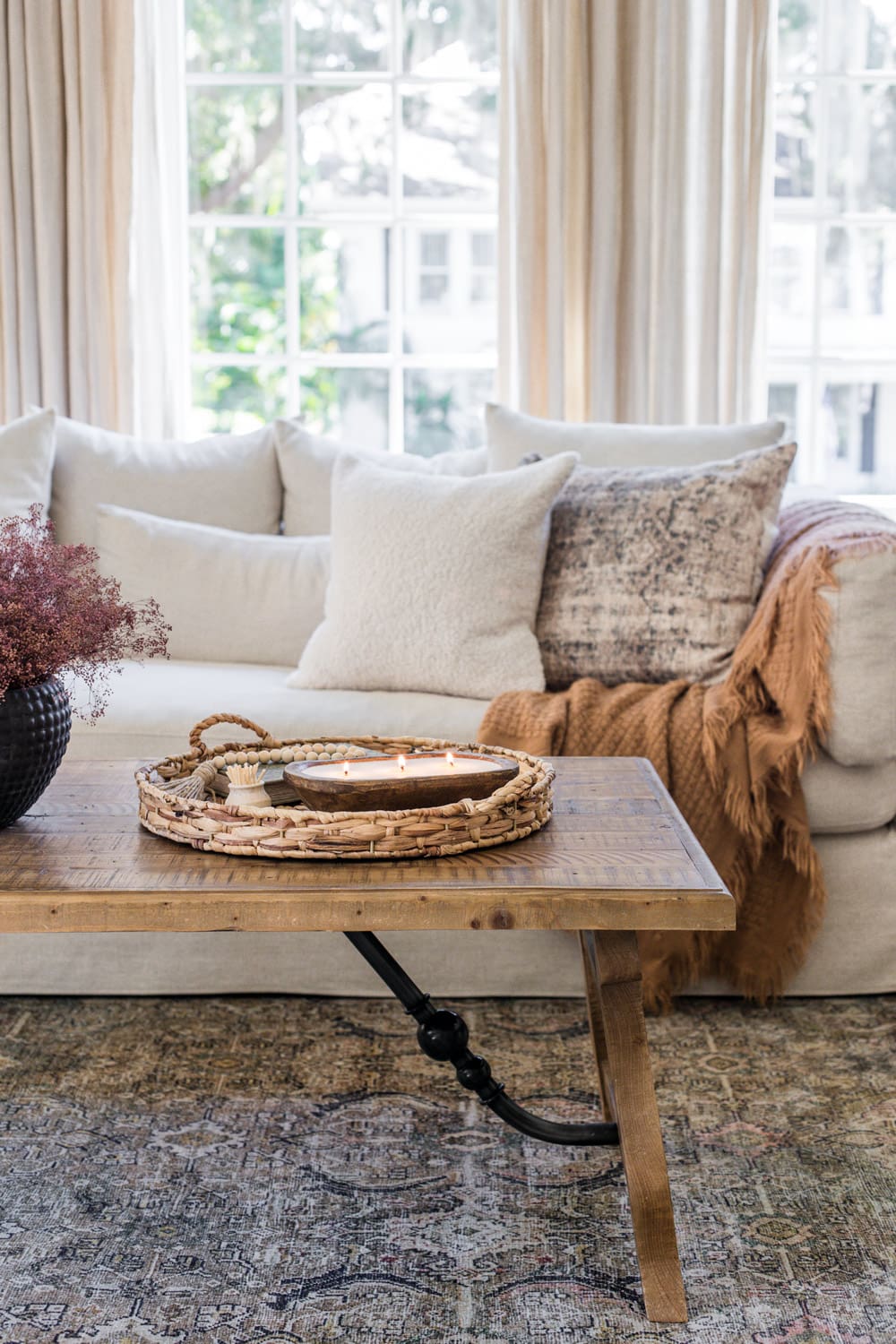 cozy fall living room with candle burning