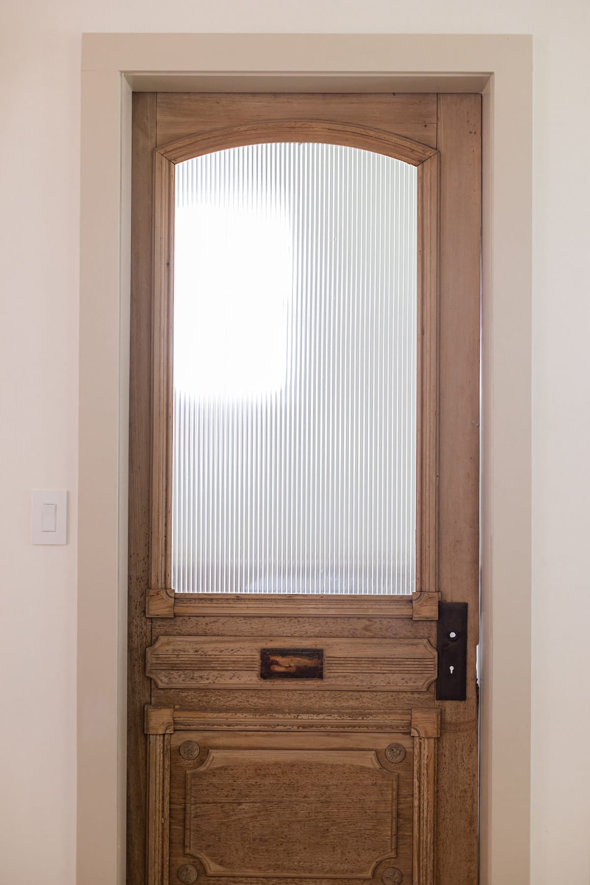 reeded glass window film on a laundry room door