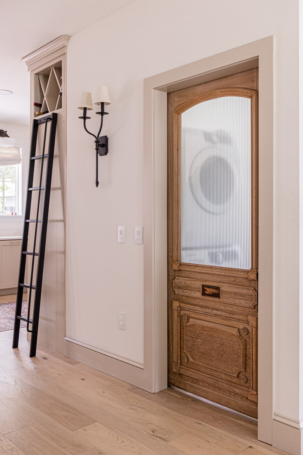 antique laundry room door with reeded glass