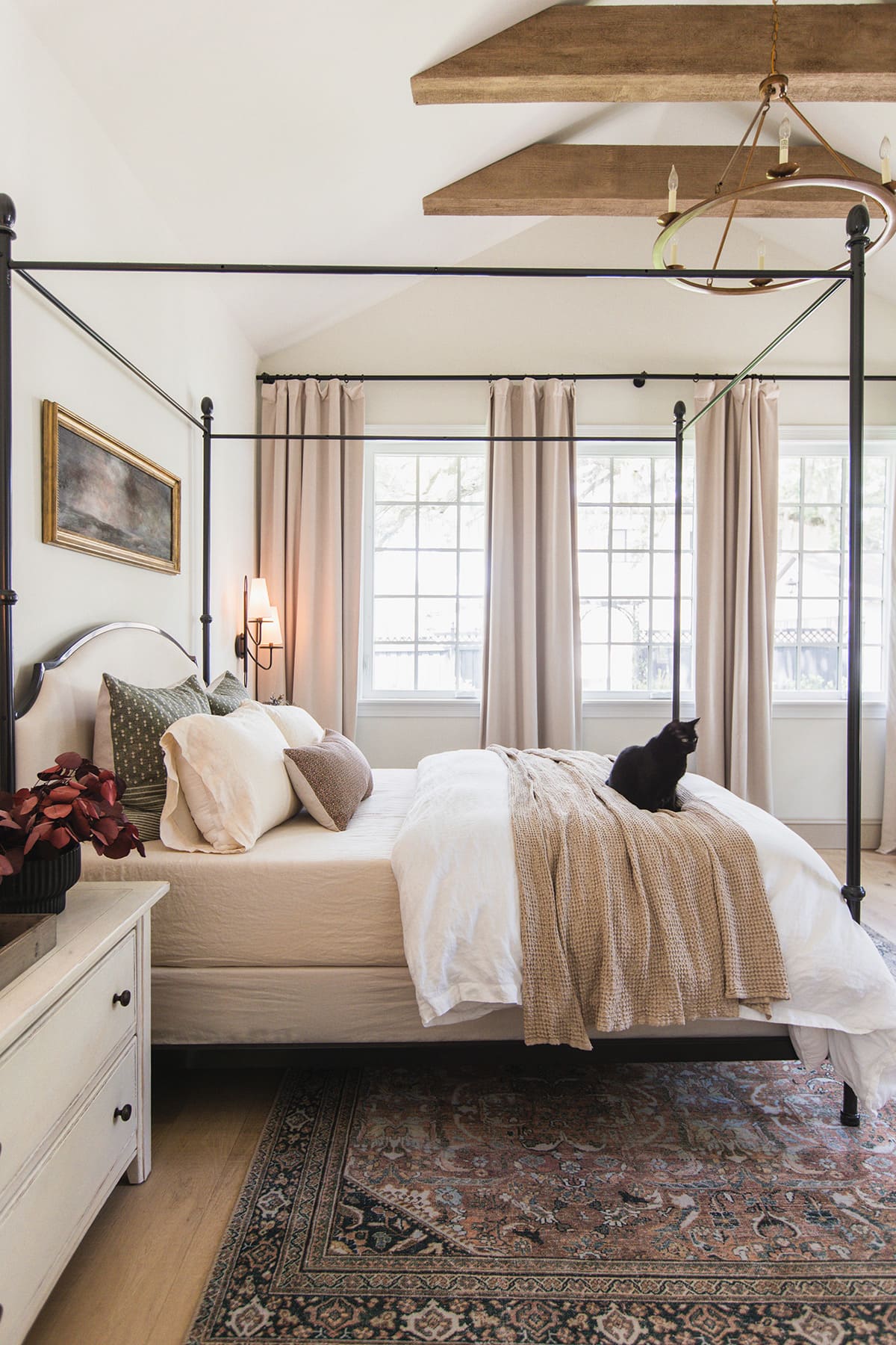 neutral bedroom with canopy bed