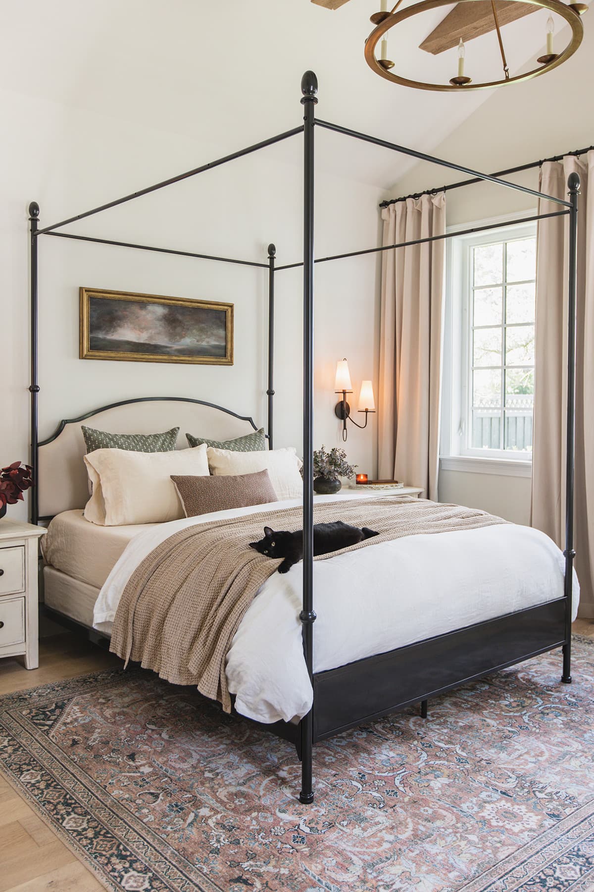 neutral bedroom with canopy bed