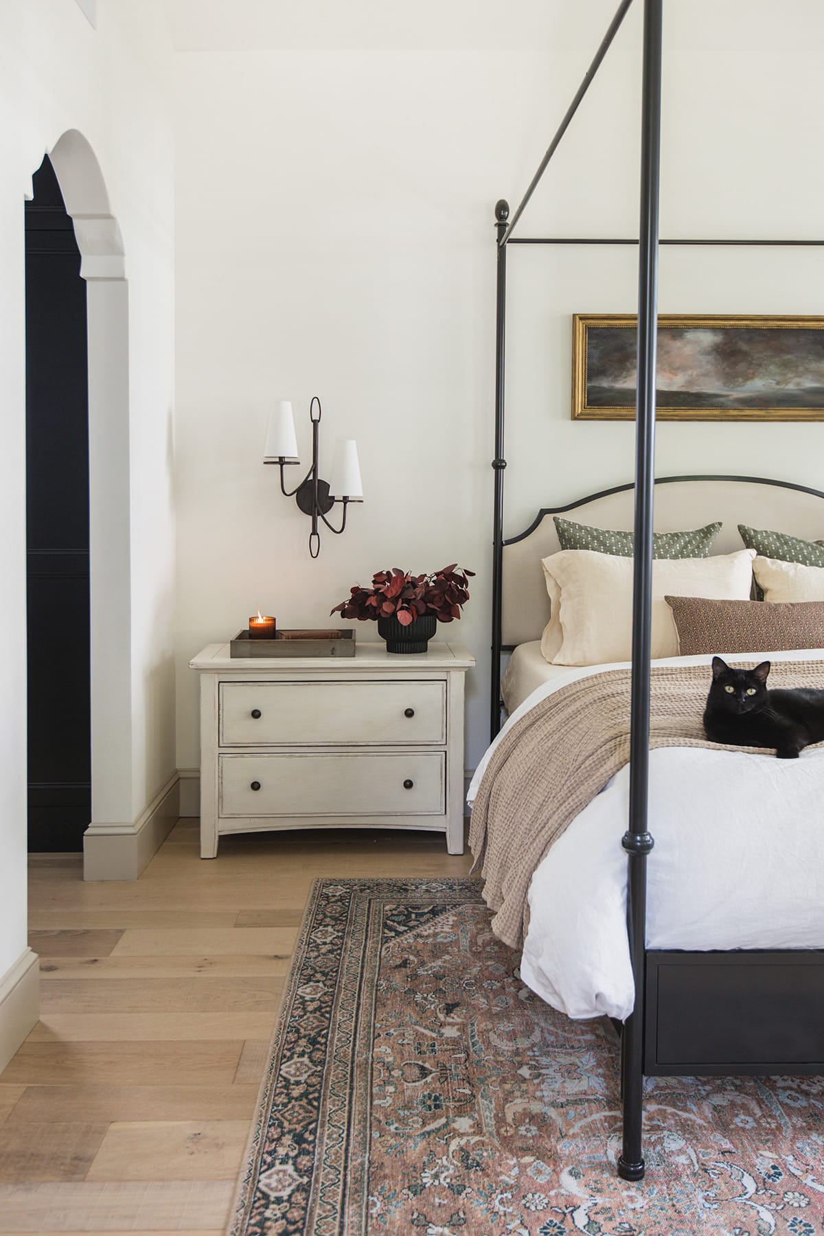 neutral bedroom with canopy bed