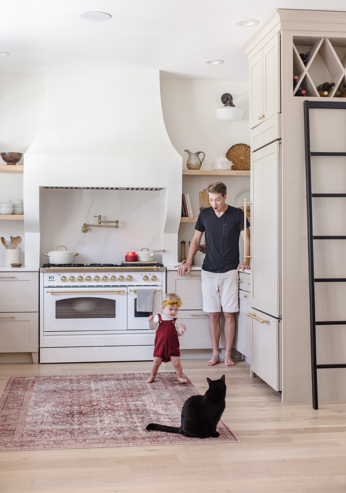 baby's first steps in kitchen