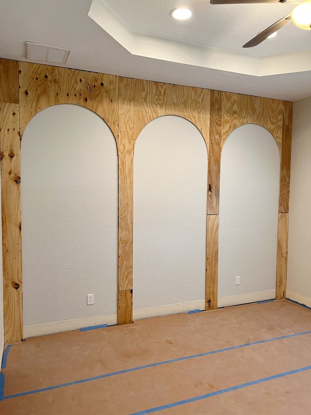 diy wall arches on bedroom wall