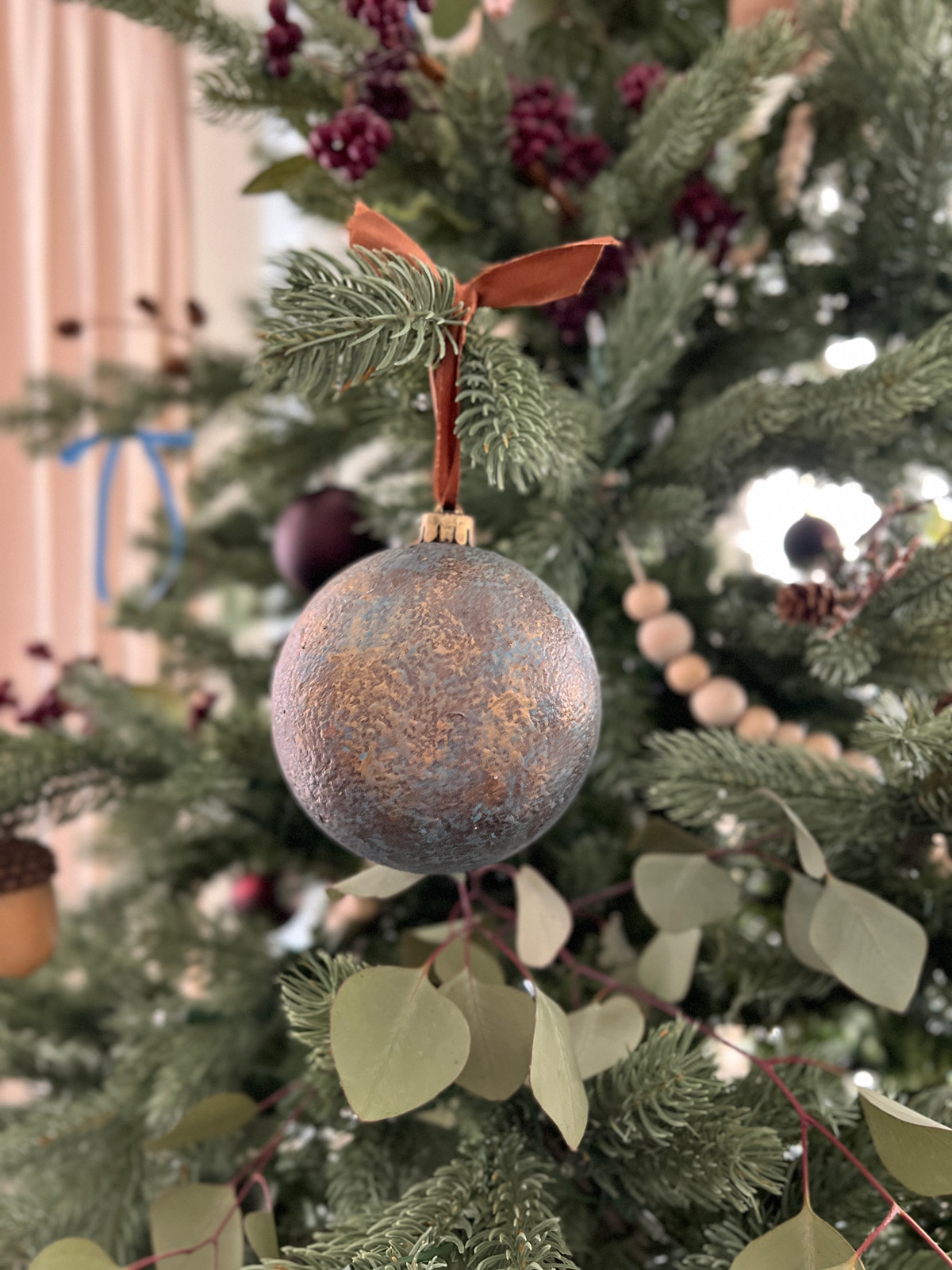 diy aged patina iron christmas ornaments with ribbon