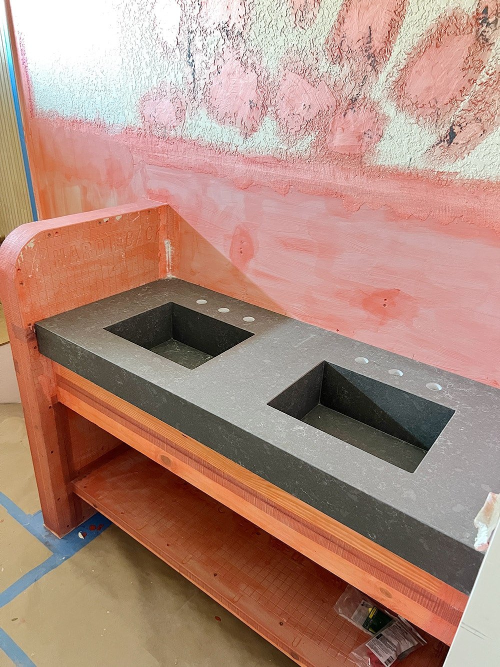 gray quartz bathroom counter with integrated sinks