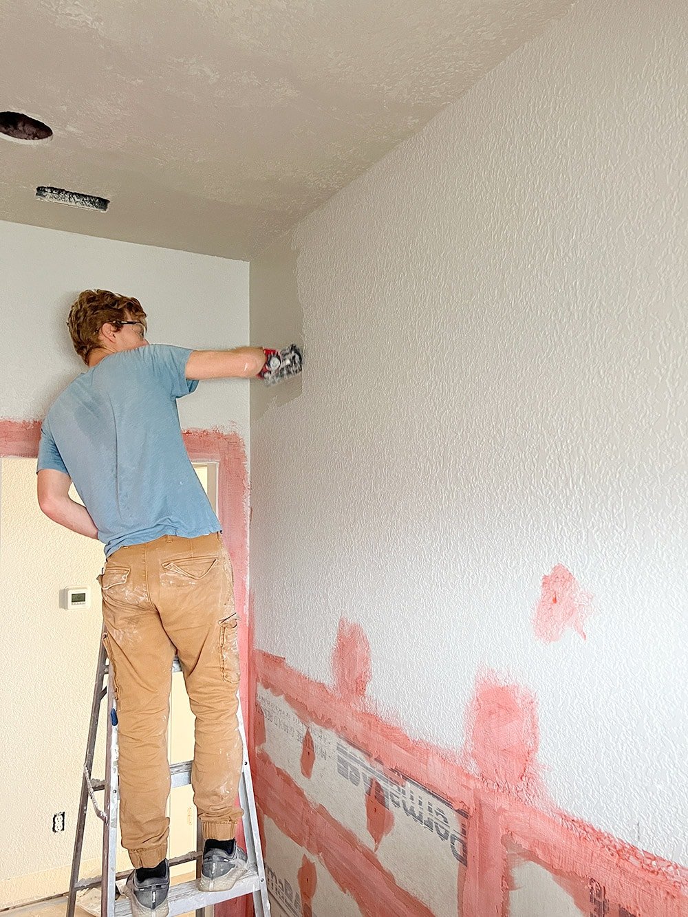 applying microcement to bathroom walls