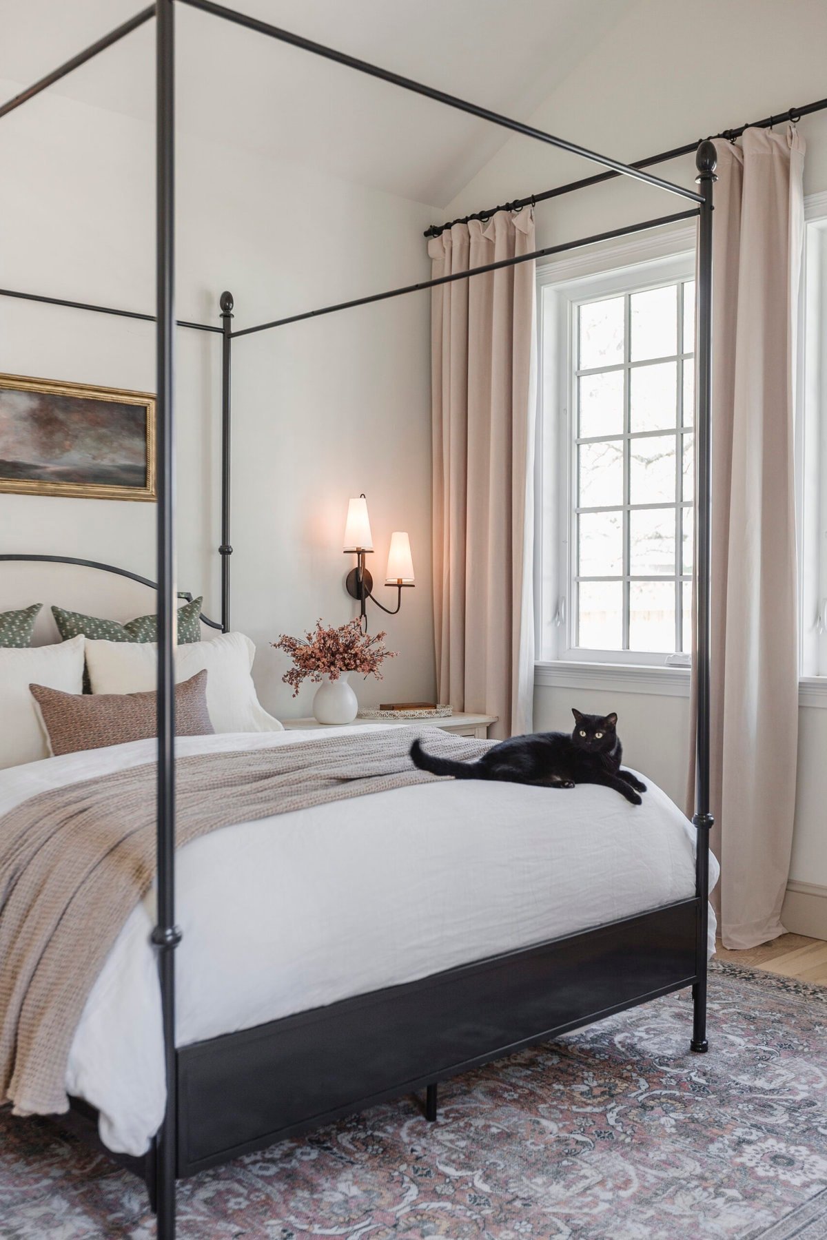 bedroom with velvet curtains and canopy bed