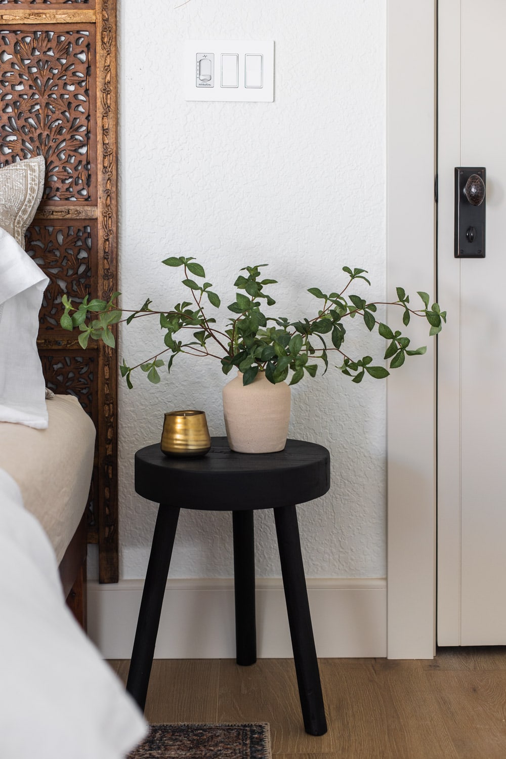 faux greenery in vase from target in bedroom