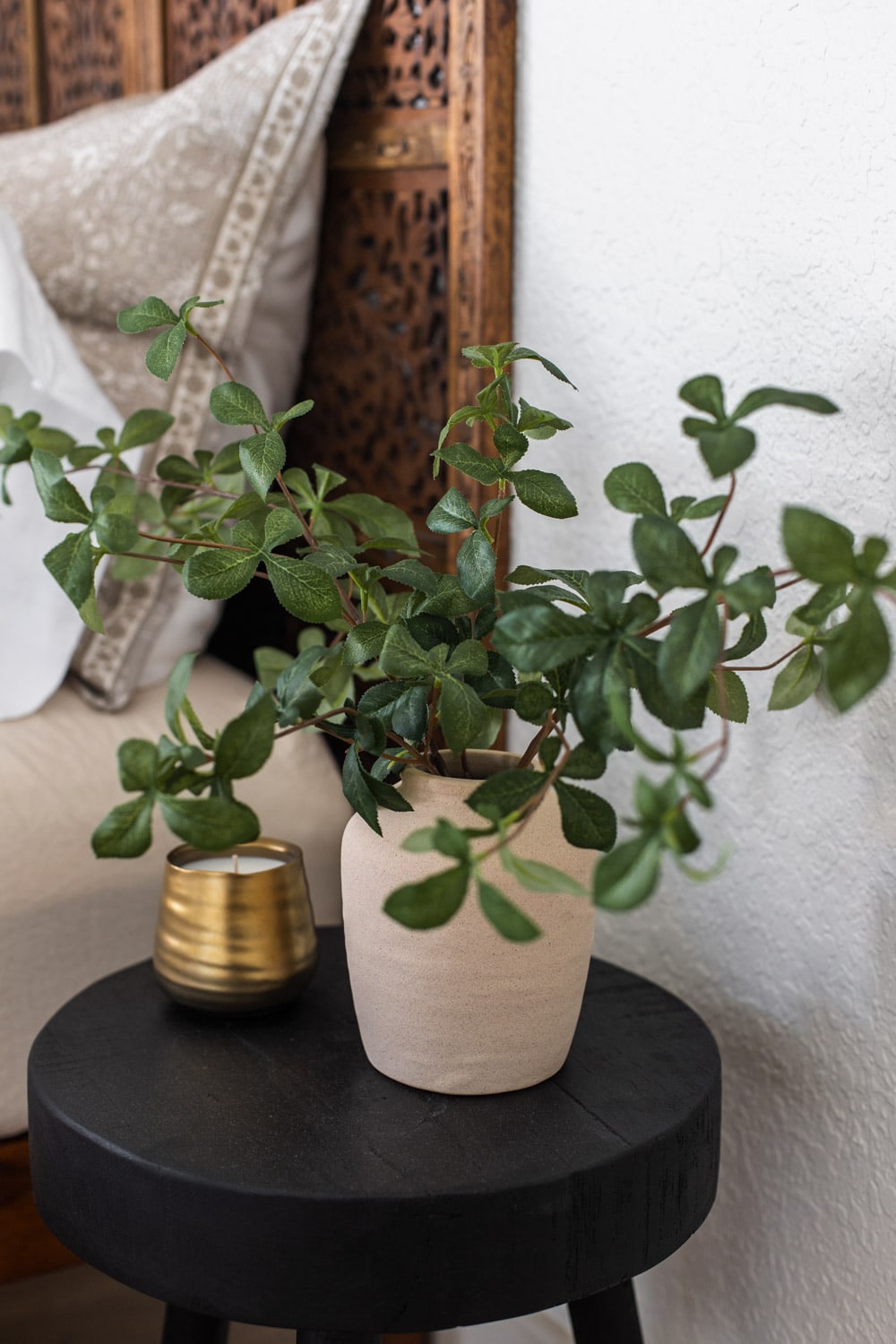 faux greenery in vase from target in bedroom