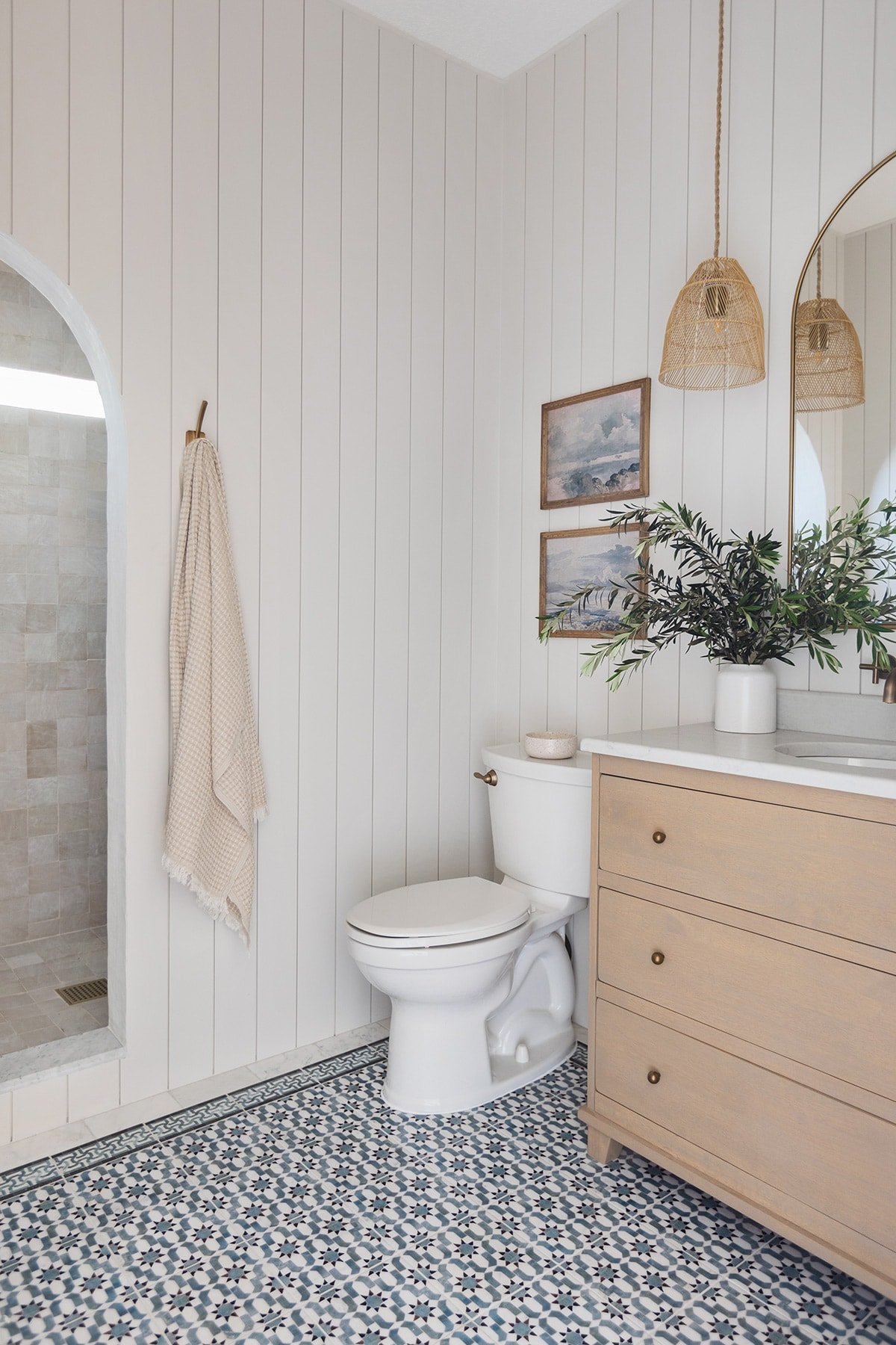 bathroom with shiplap sherwin williams egret white walls and wood vanity