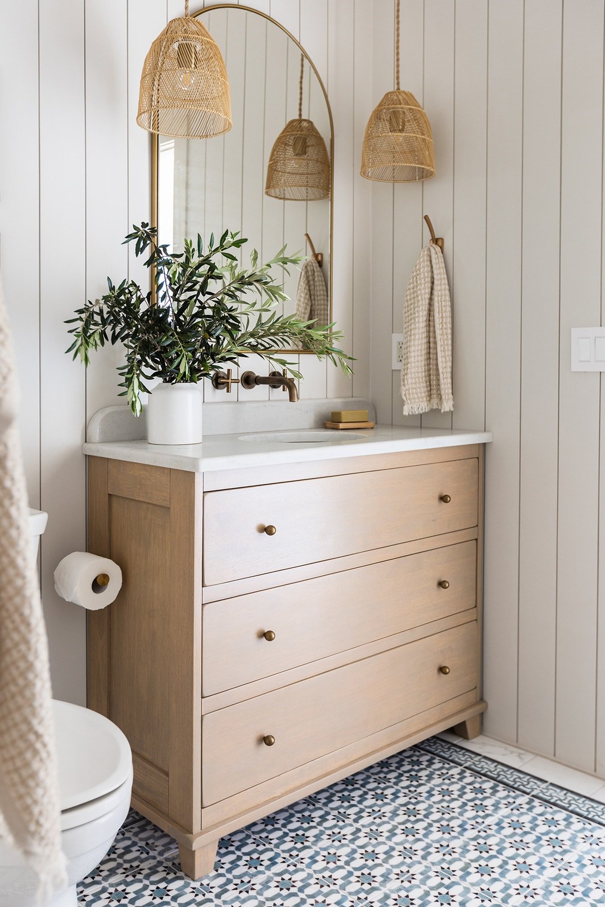bathroom with sherwin williams egret white shiplap walls and wood dresser vanity