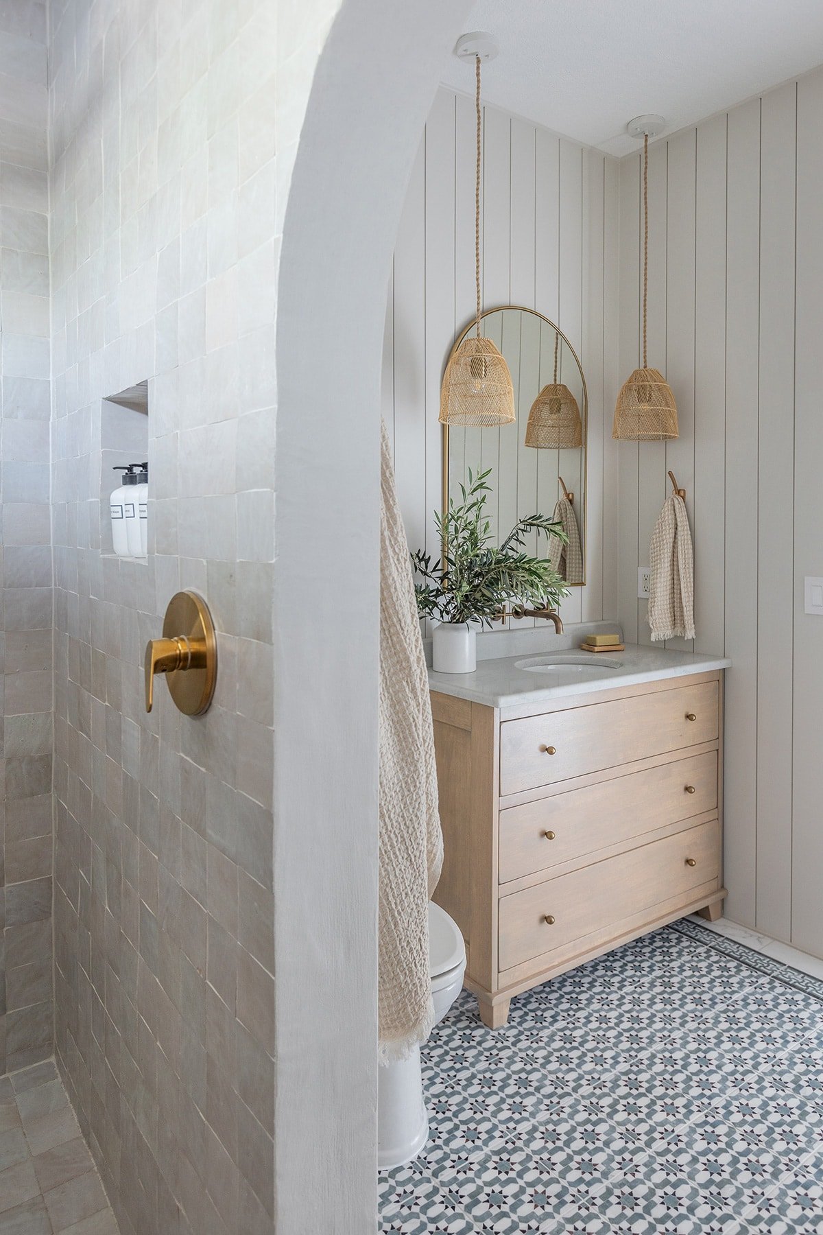 bathroom with sherwin williams egret white shiplap walls and zellige tile shower